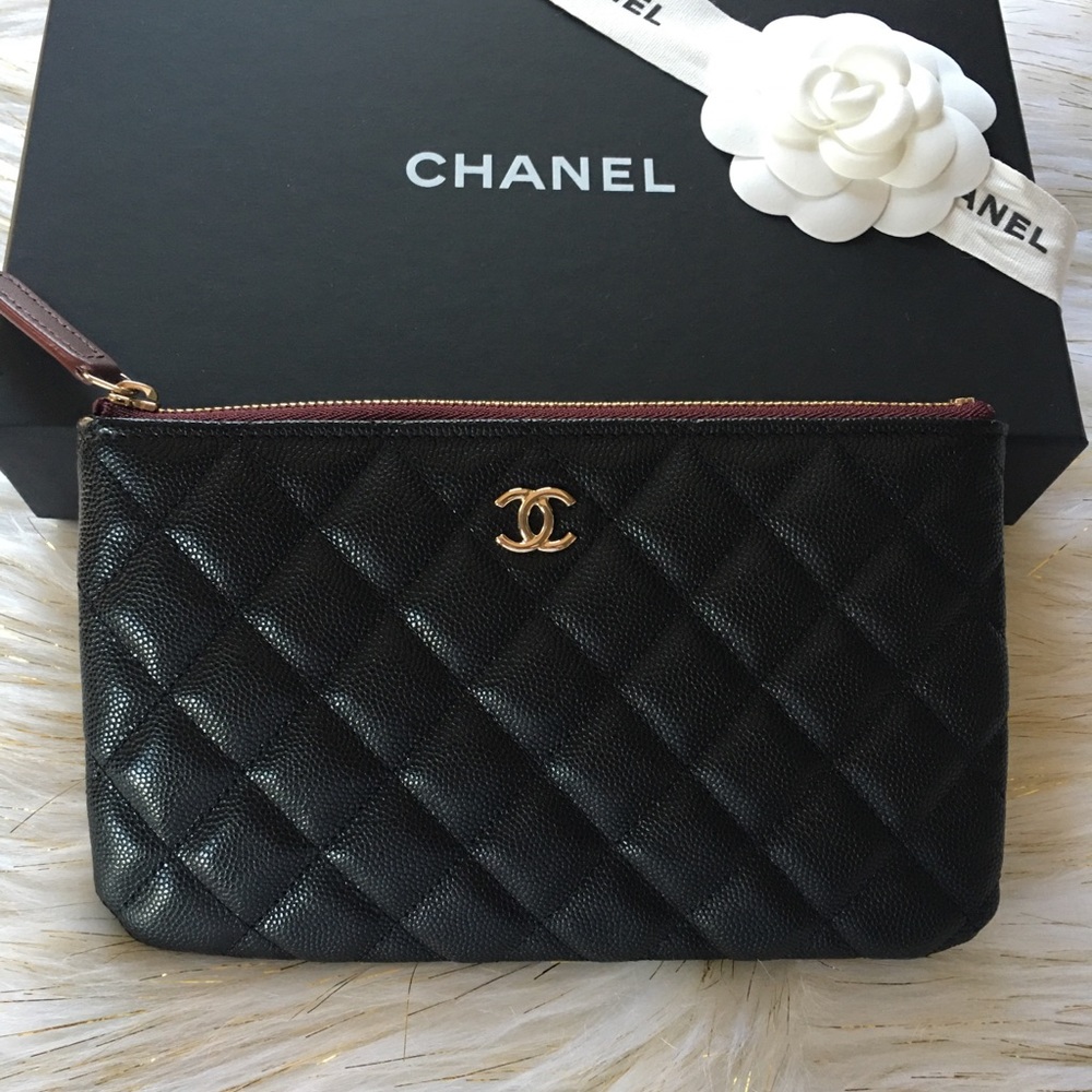 Authentic BNIB CHANEL small o-case